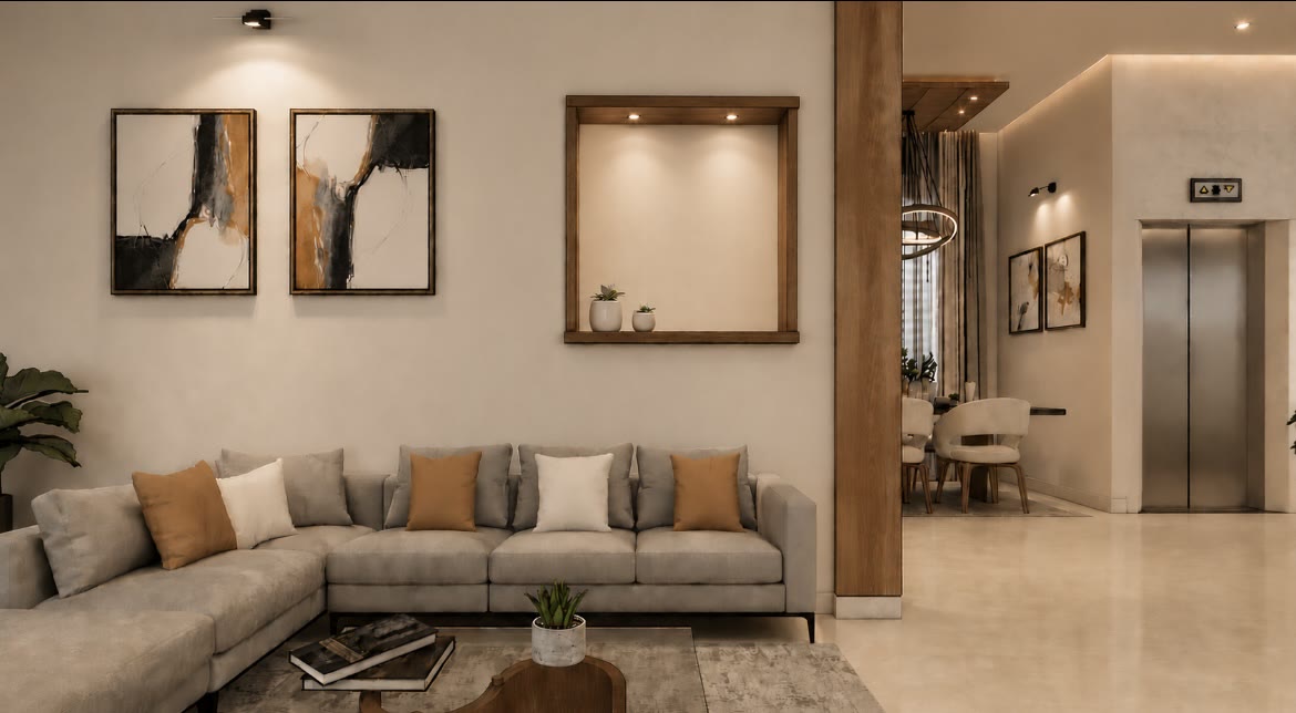 Living room design with sectional sofa, framed art and open dining beyond