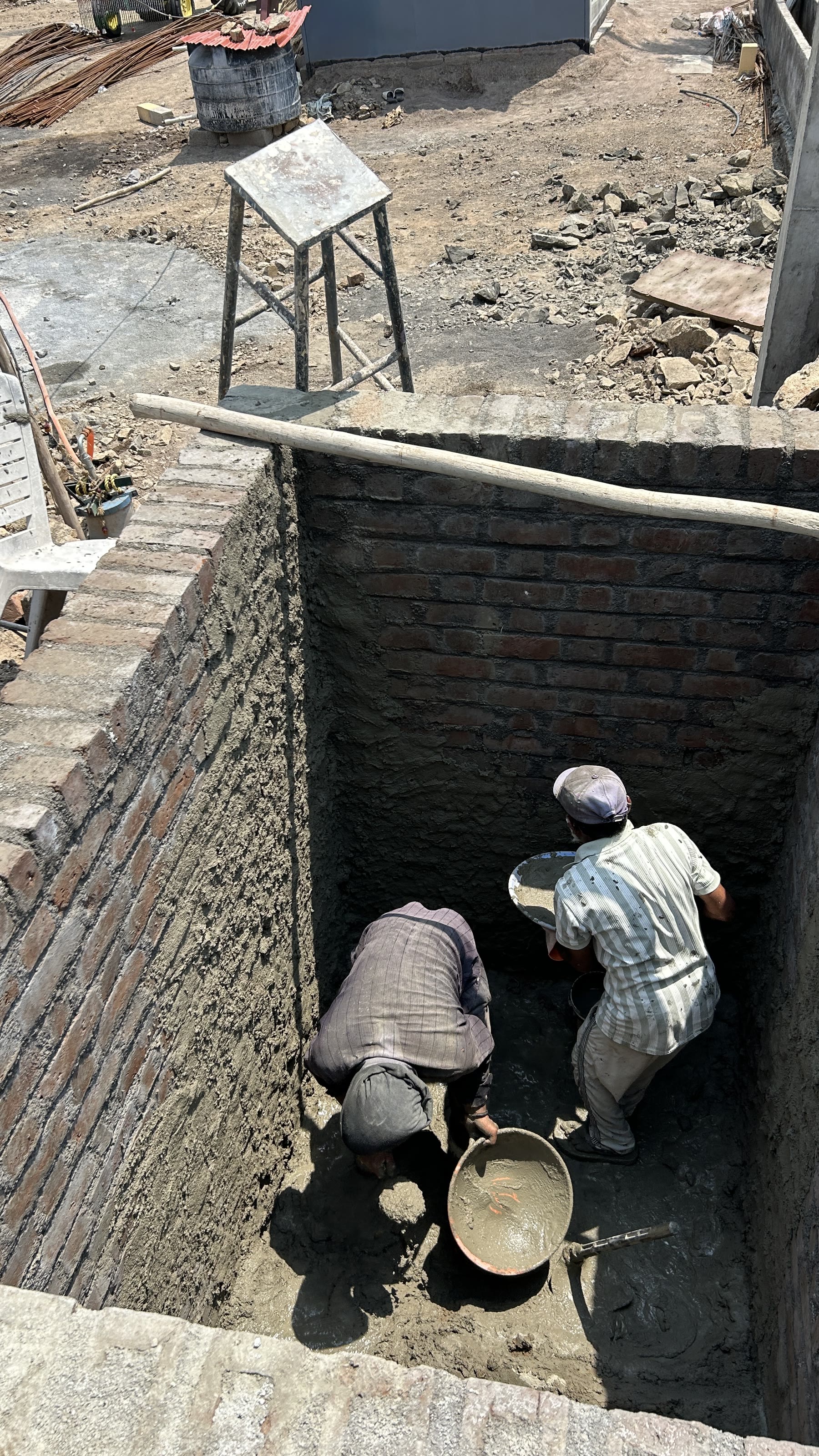 Exterior elevation of a house under construction with scaffolding